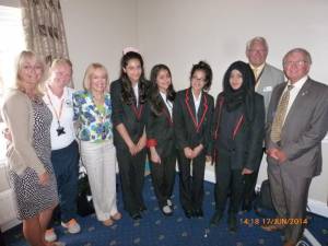 Samreena, Ayshah, Faizah and Annam flanked by staff and Rotarians.